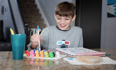 Student doing some art homework at home